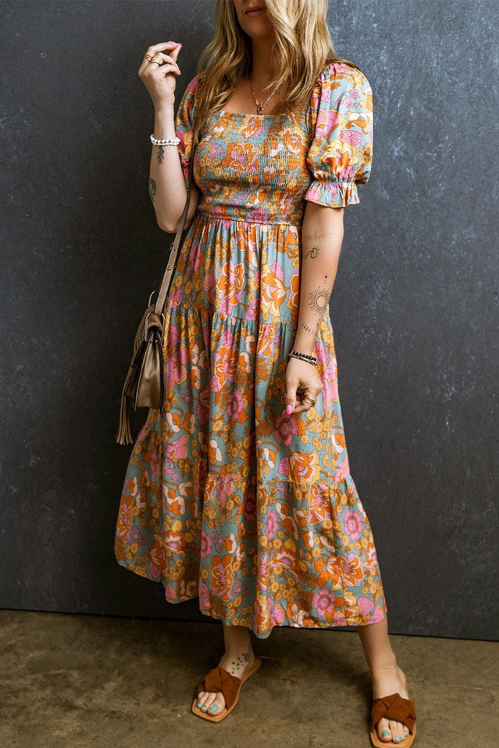 Anaïs™ | Gesmokte Taillejurk mit Blumen und Puffärmeln