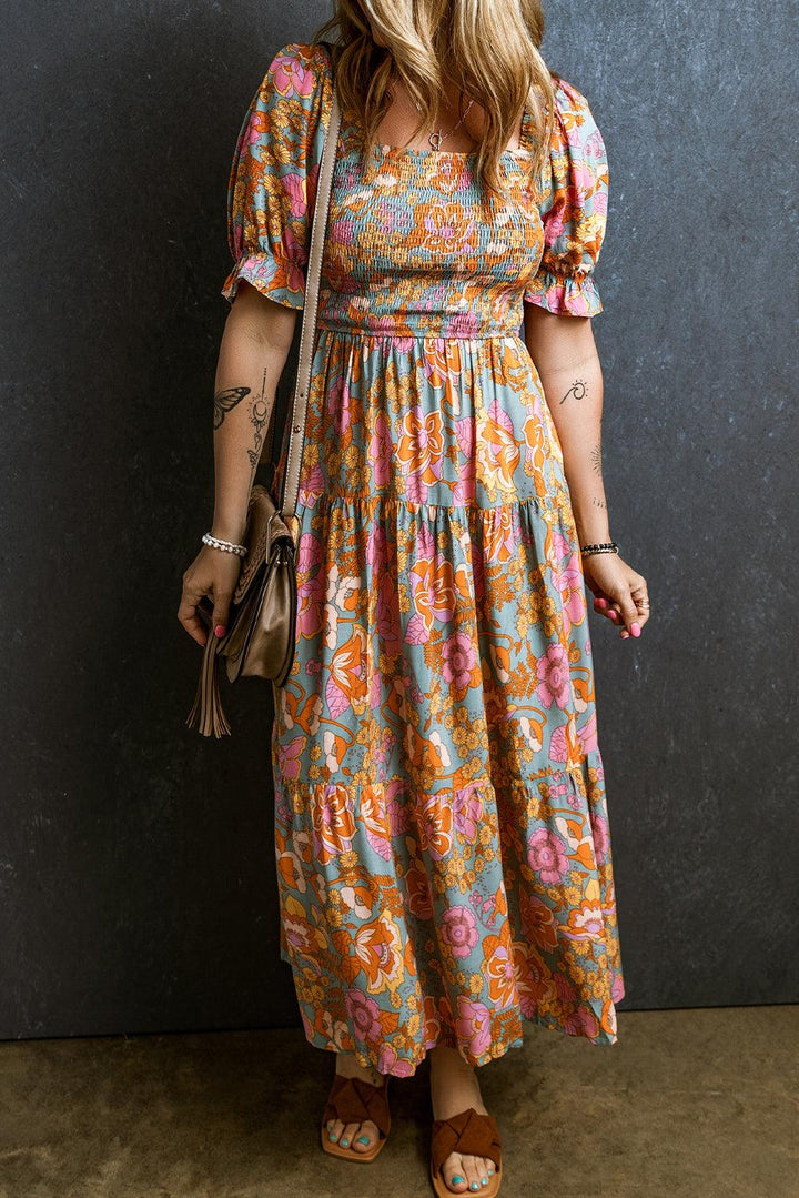 Anaïs™ | Gesmokte Taillejurk mit Blumen und Puffärmeln