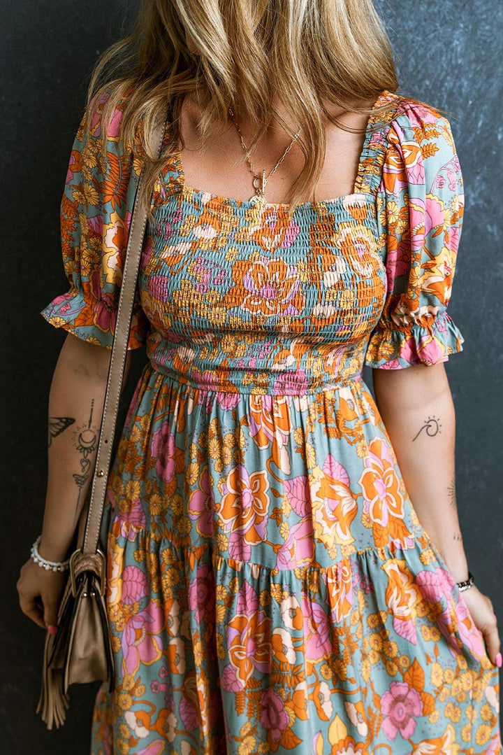 Anaïs™ | Gesmokte Taillejurk mit Blumen und Puffärmeln